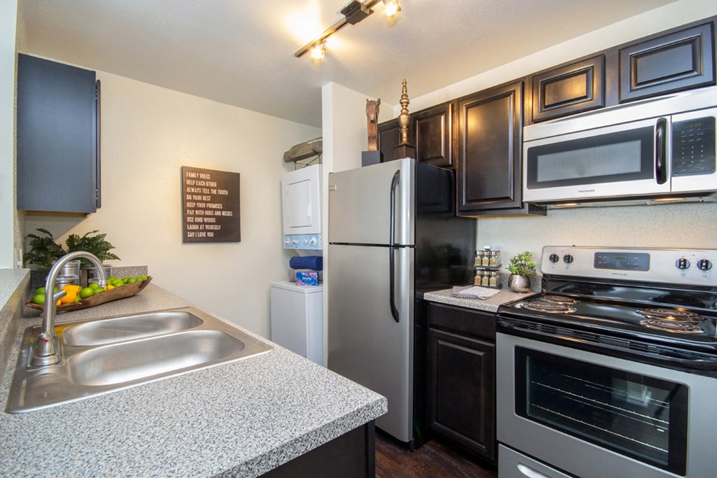 the preserve at ballantyne commons apartment kitchen with stainless steel appliances