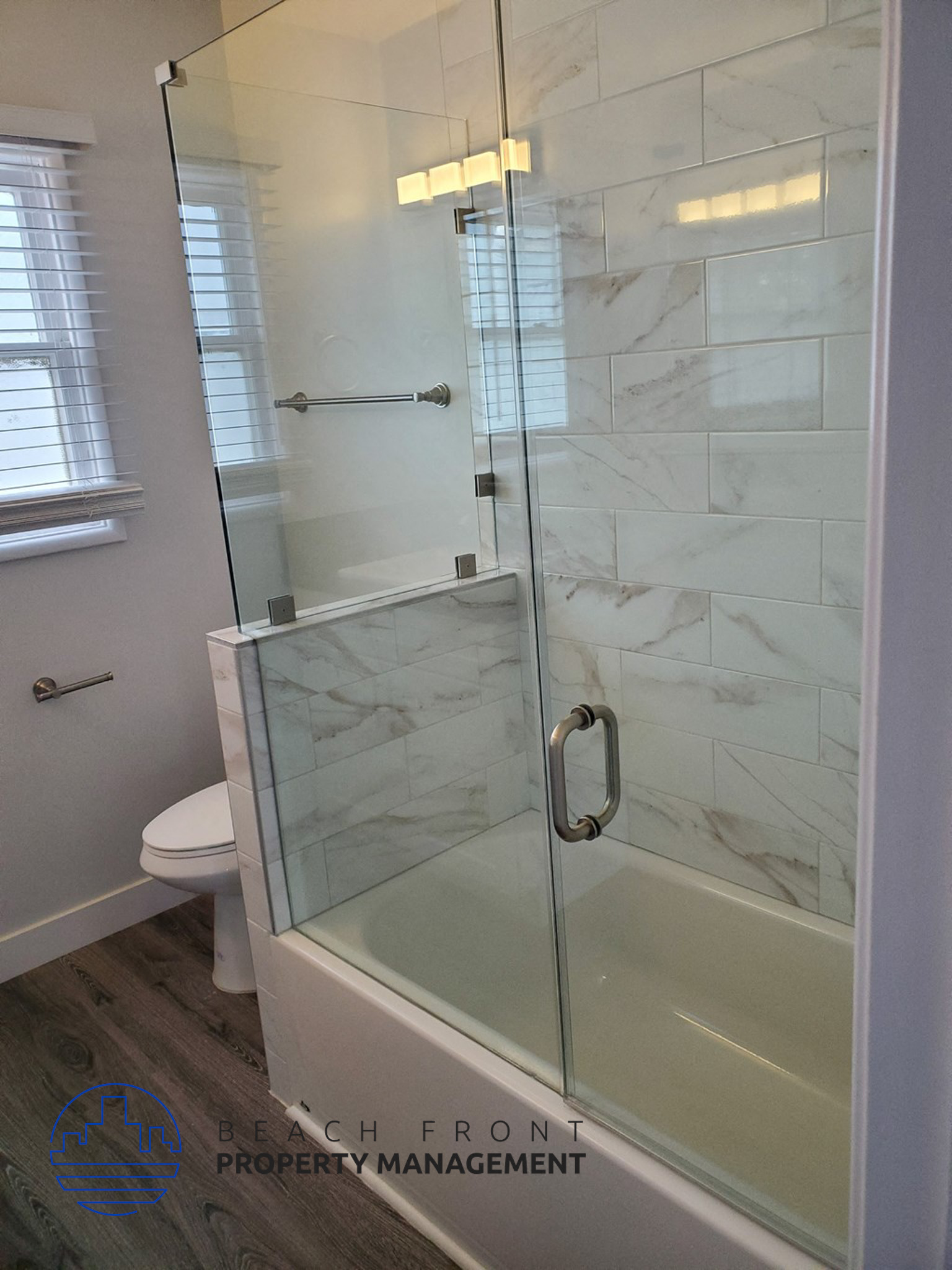 a small bathroom with a shower and a toilet