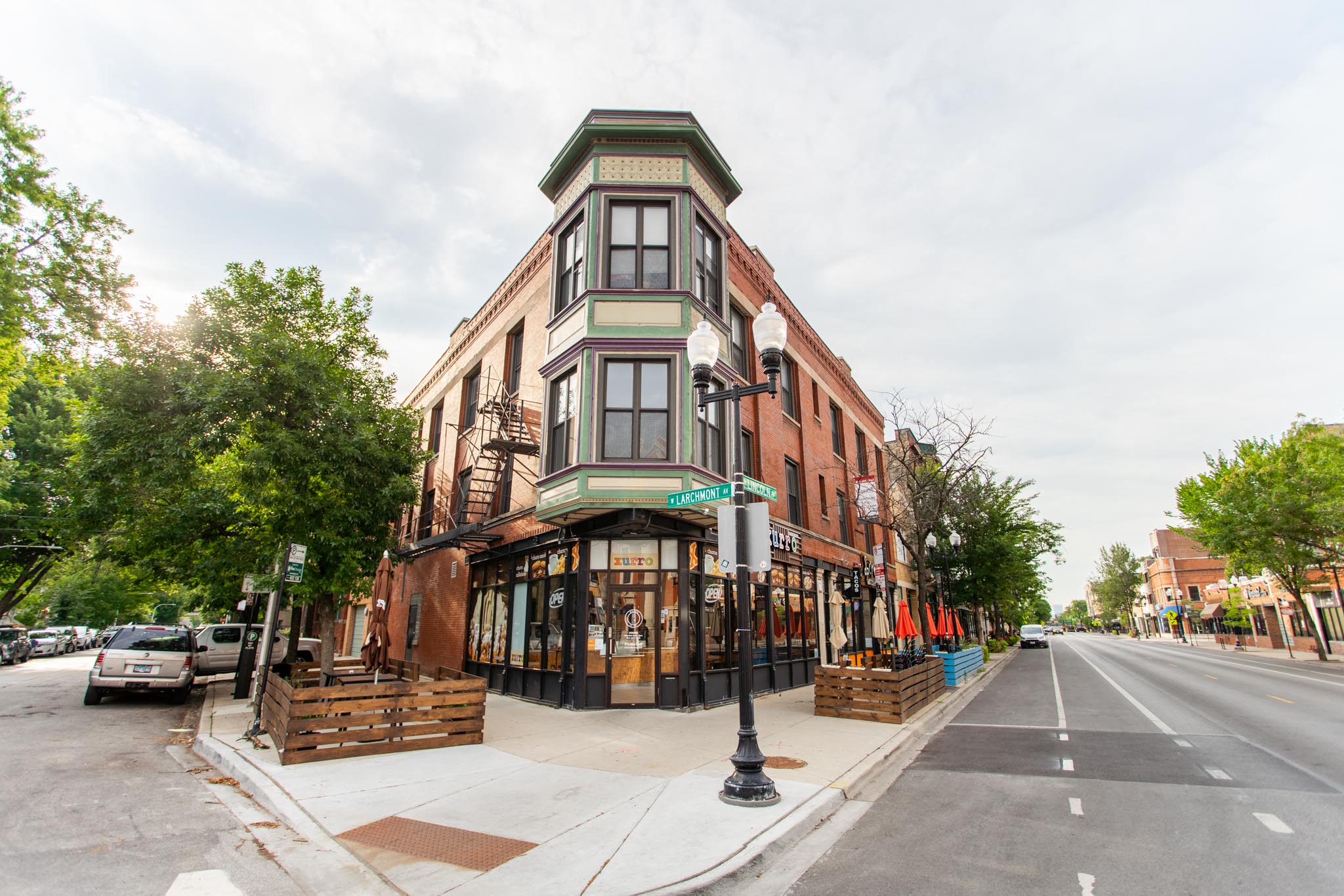 a building on the corner of a city street