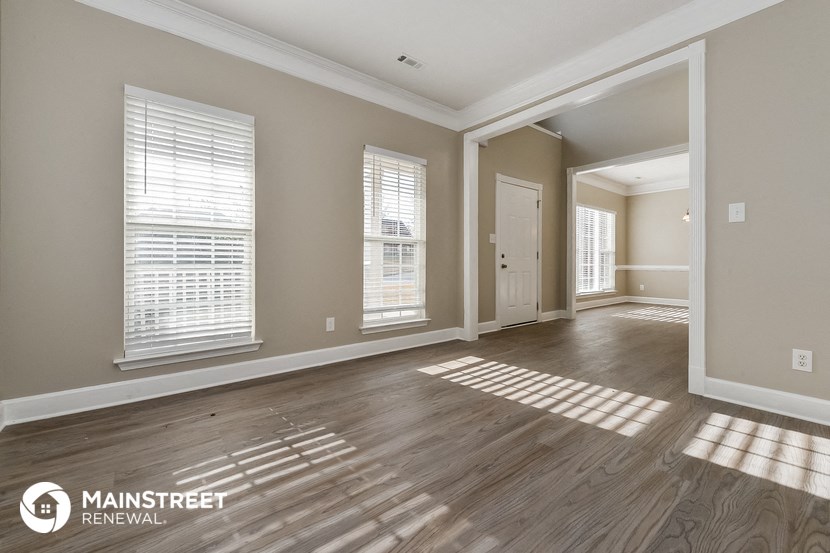 the living room and dining room are spacious and open to the hallway