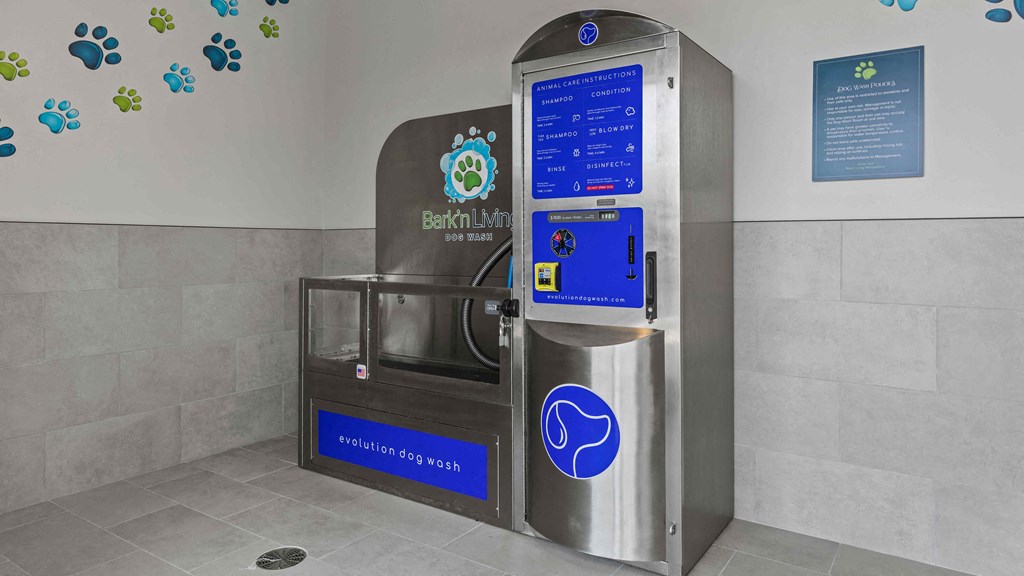 an atm machine in the lobby of a subway station