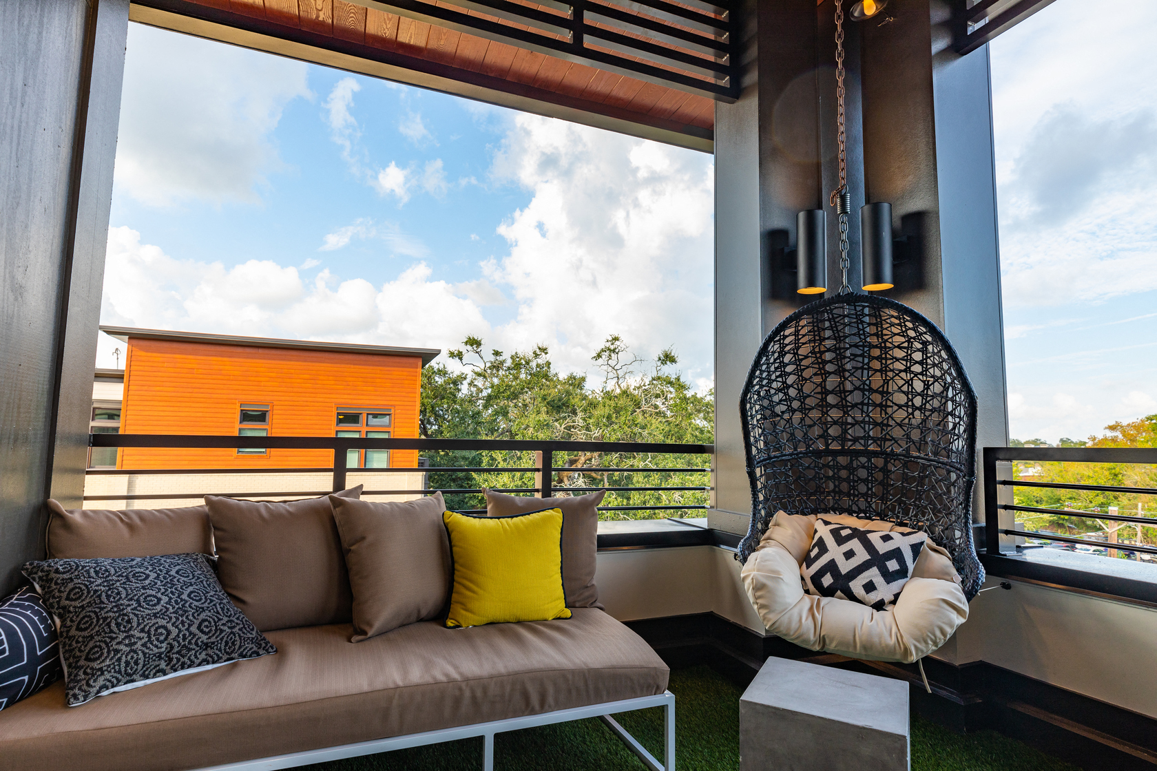a living room with a couch and a large window
