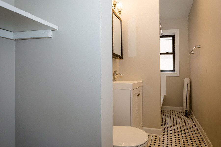 a small bathroom with a toilet and a sink