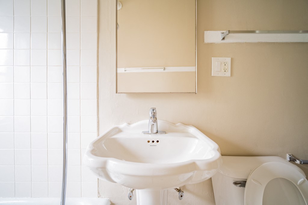 a small bathroom with a sink and a toilet