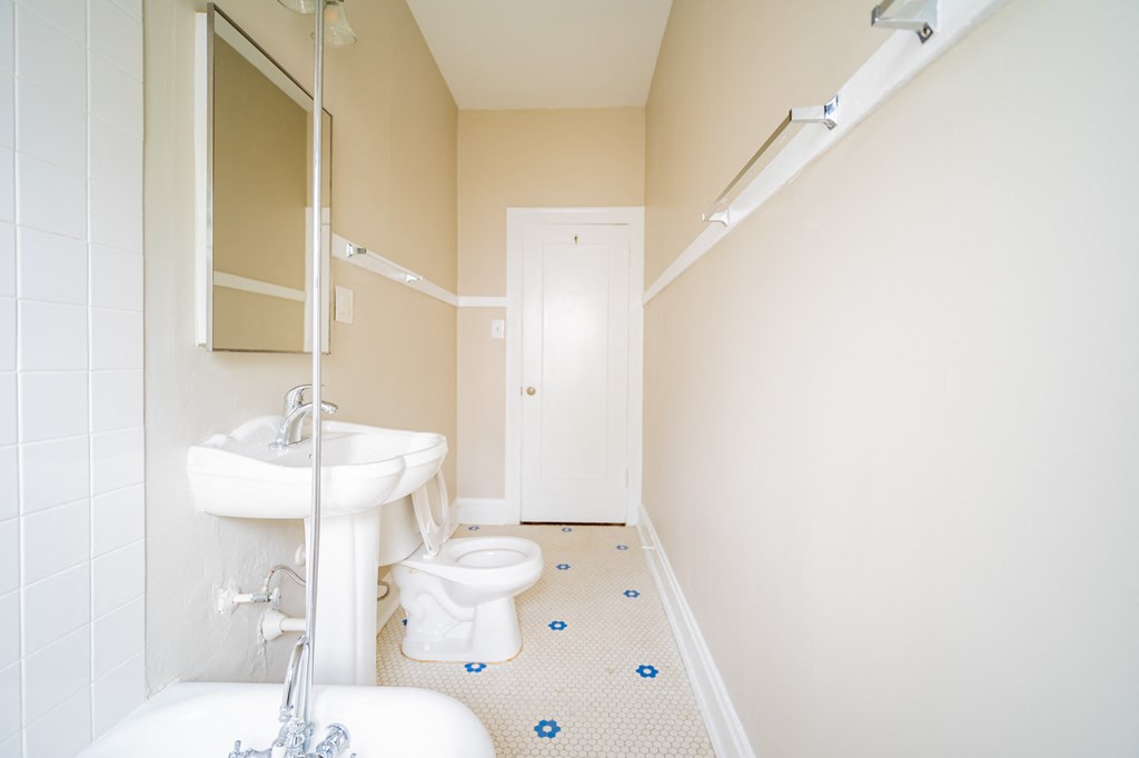 a small bathroom with a sink and a toilet