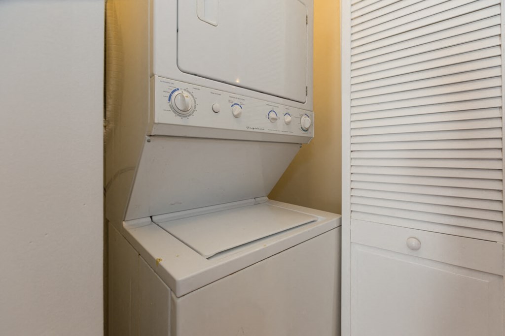 the laundry room has a washer and dryer in it
