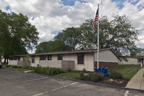 a house with an flag in front of it