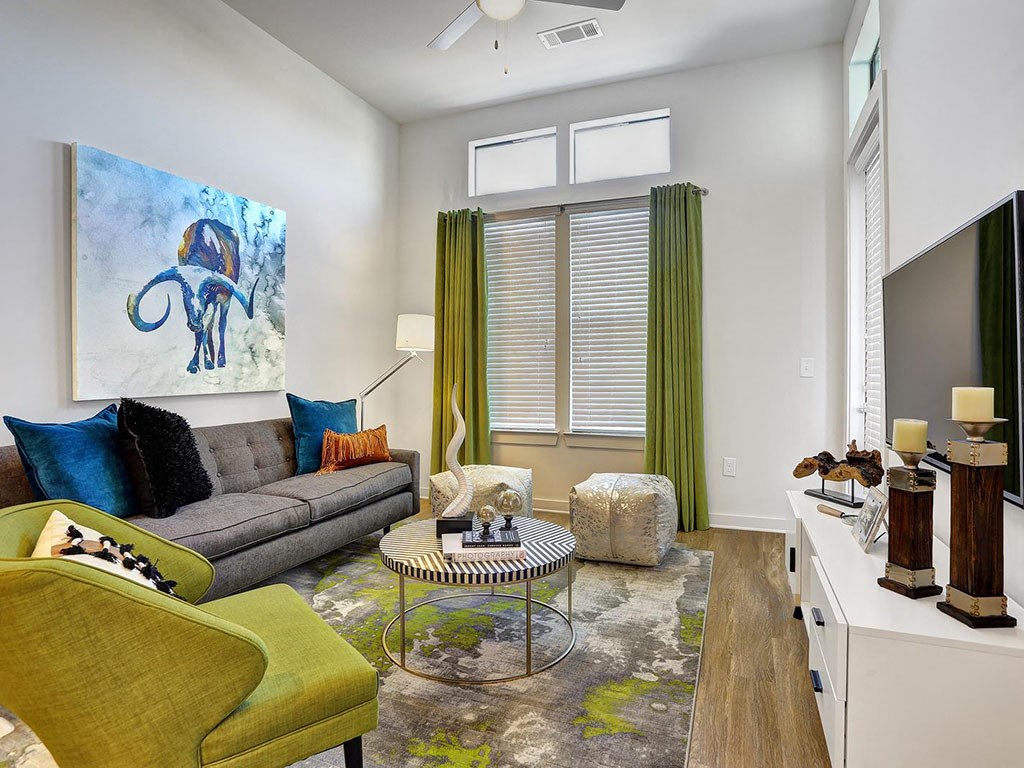 a living room with a couch and a table