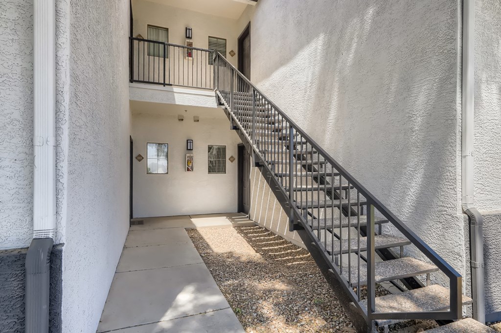 the stairway up to the second floor of an apartment building