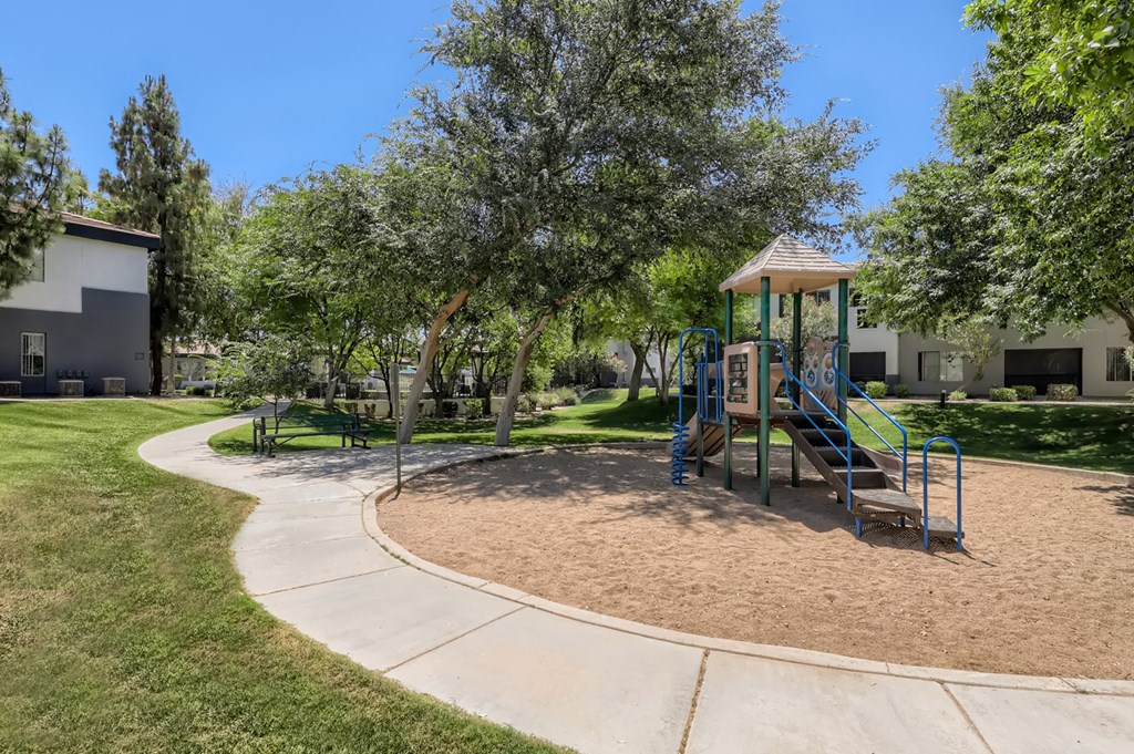 the preserve at ballantyne commons playground with swing set and trees