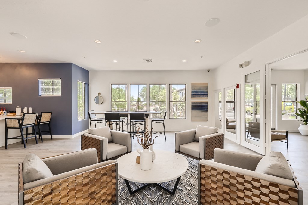 the preserve at ballantyne commons living room with couches and a table