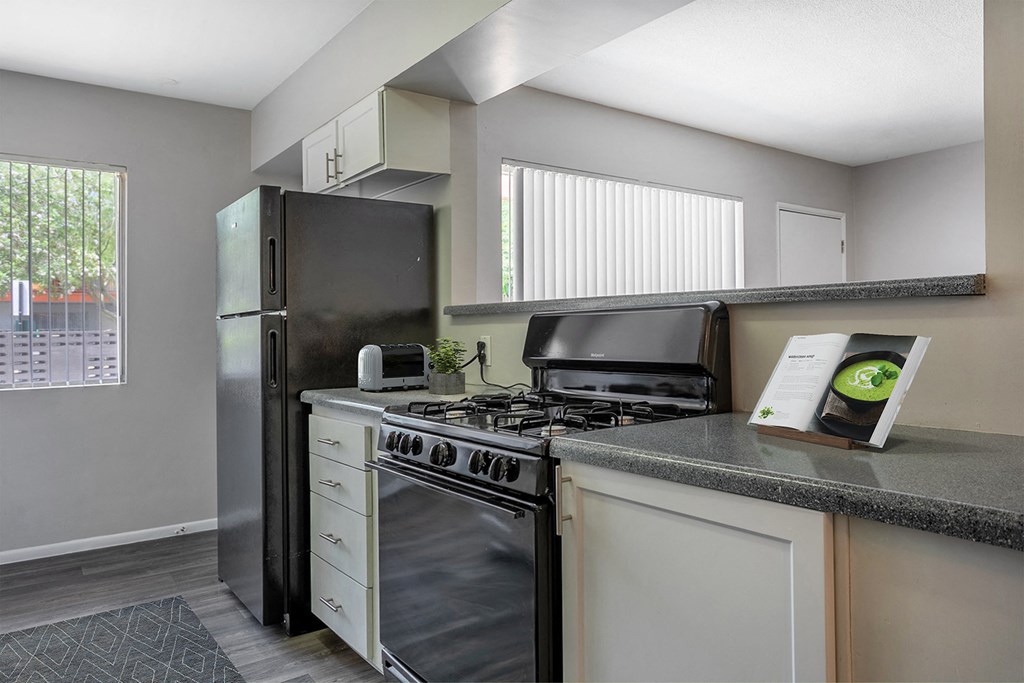 the preserve at ballantyne commons apartment kitchen with stainless steel appliances