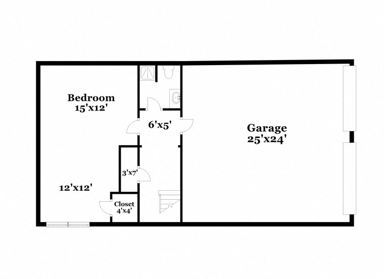 a floor plan of a house with a bedroom and a living room and a garage