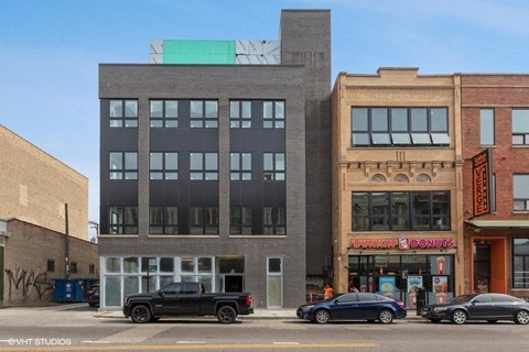 a building on the corner of a city street