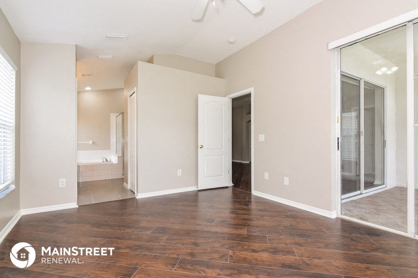 the living room and entrance to the master suite