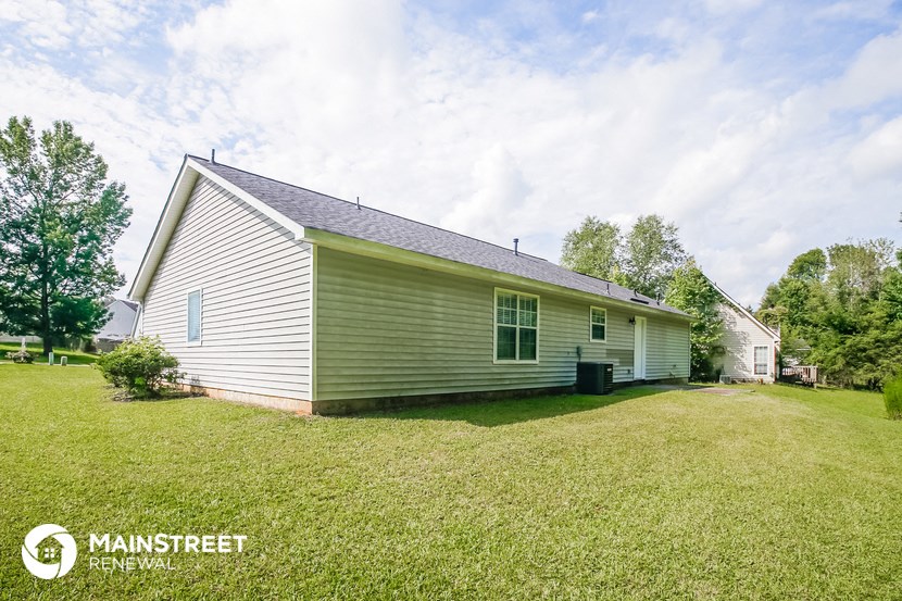 the view of the front of the house from the backyard