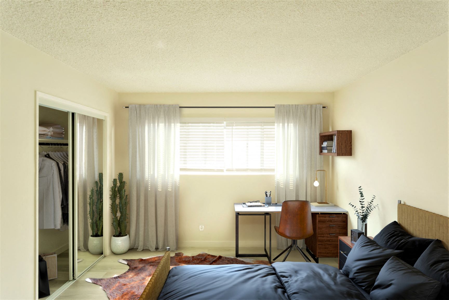 Bright, spacious bedroom with large window and closet