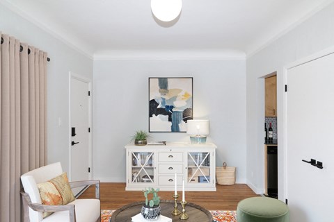 Artfully decorated living area with plenty of space to sit and hang out