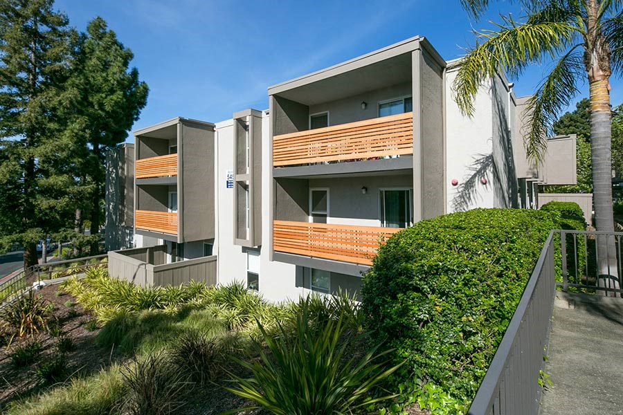 exterior shot of the building showing off the patios at Bayside Apartments in Pinole, CA