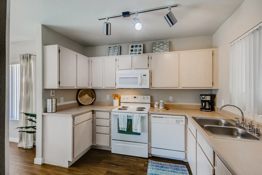 the preserve at ballantyne commons apartment kitchen with white appliances