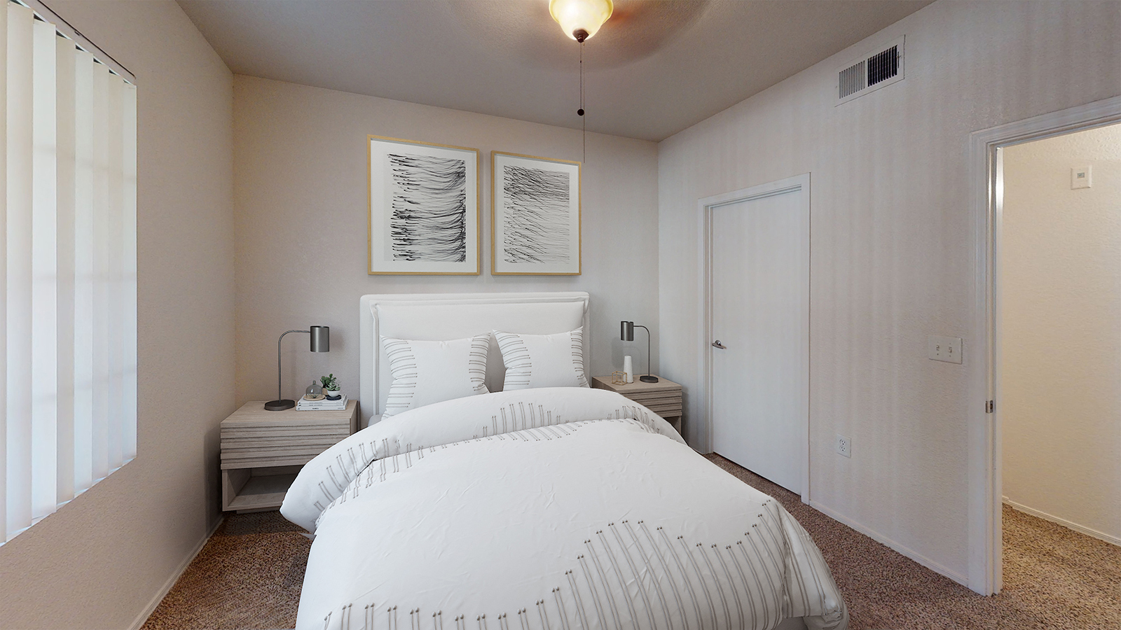 a bedroom with a large white bed and a closet