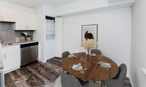 a dining room and kitchen with a wooden table and chairs