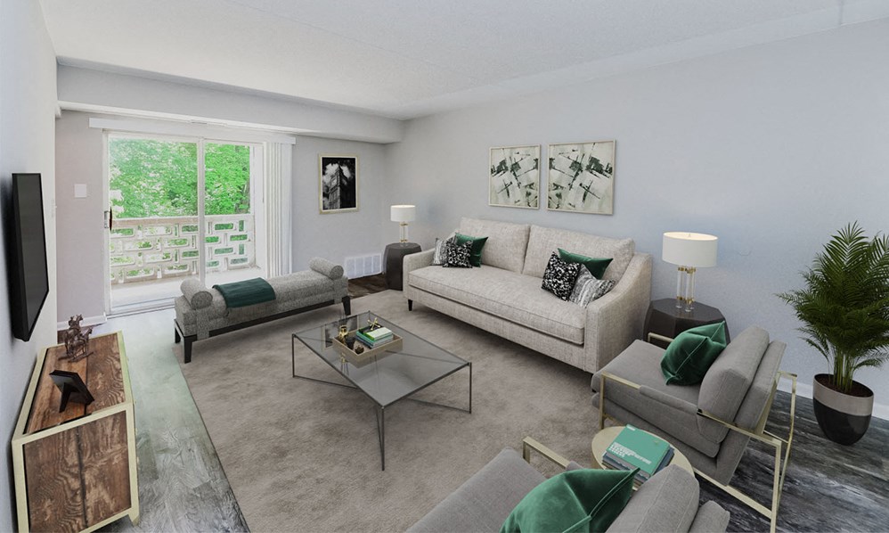 a living room with couches and chairs and a table