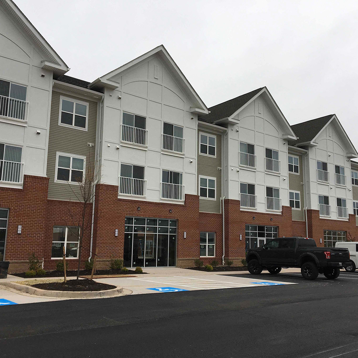 Exterior front of building with parking lot