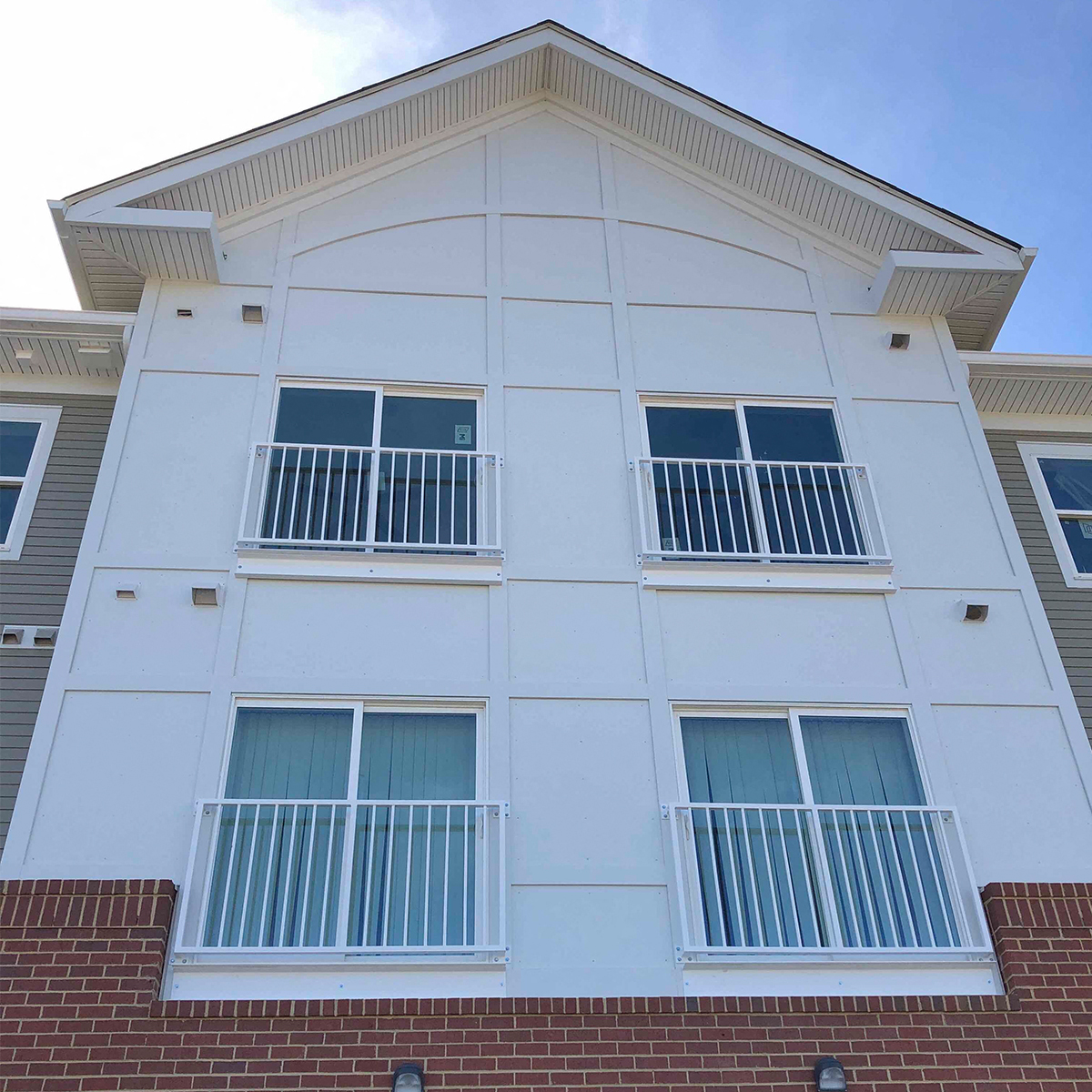 Exterior front of building with windows