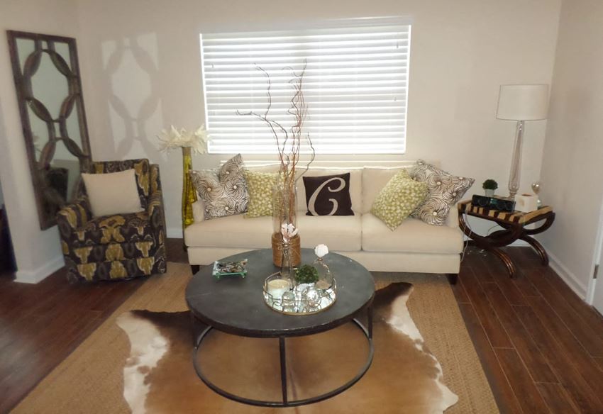 a living room with a couch and a coffee table