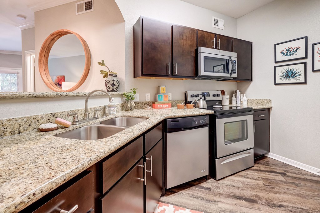 our apartments have a modern kitchen with granite counter tops and stainless steel appliances