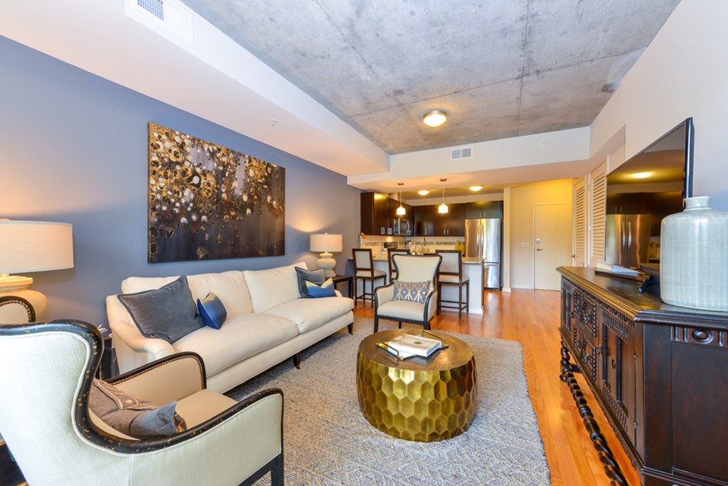 a living room with a couch and a table