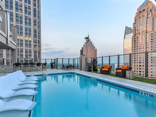 a swimming pool on the roof of a building