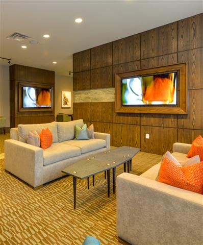 a living room with couches and a table