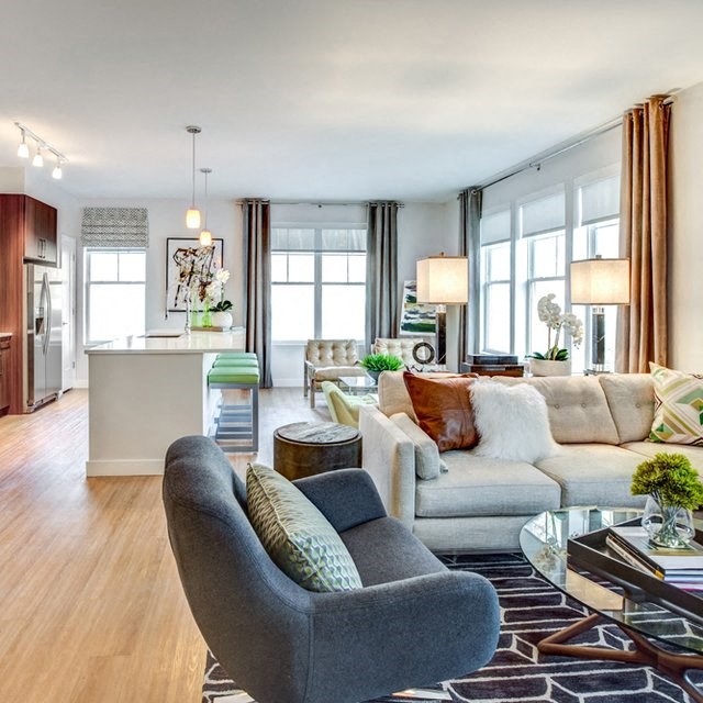 a living room with a couch and a table