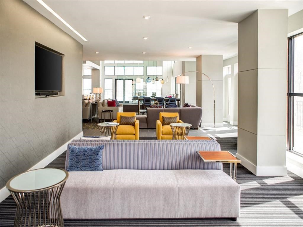 a living room with a couch and a television