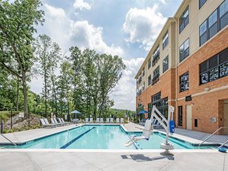 our apartments offer a swimming pool    and a poolside lounge area