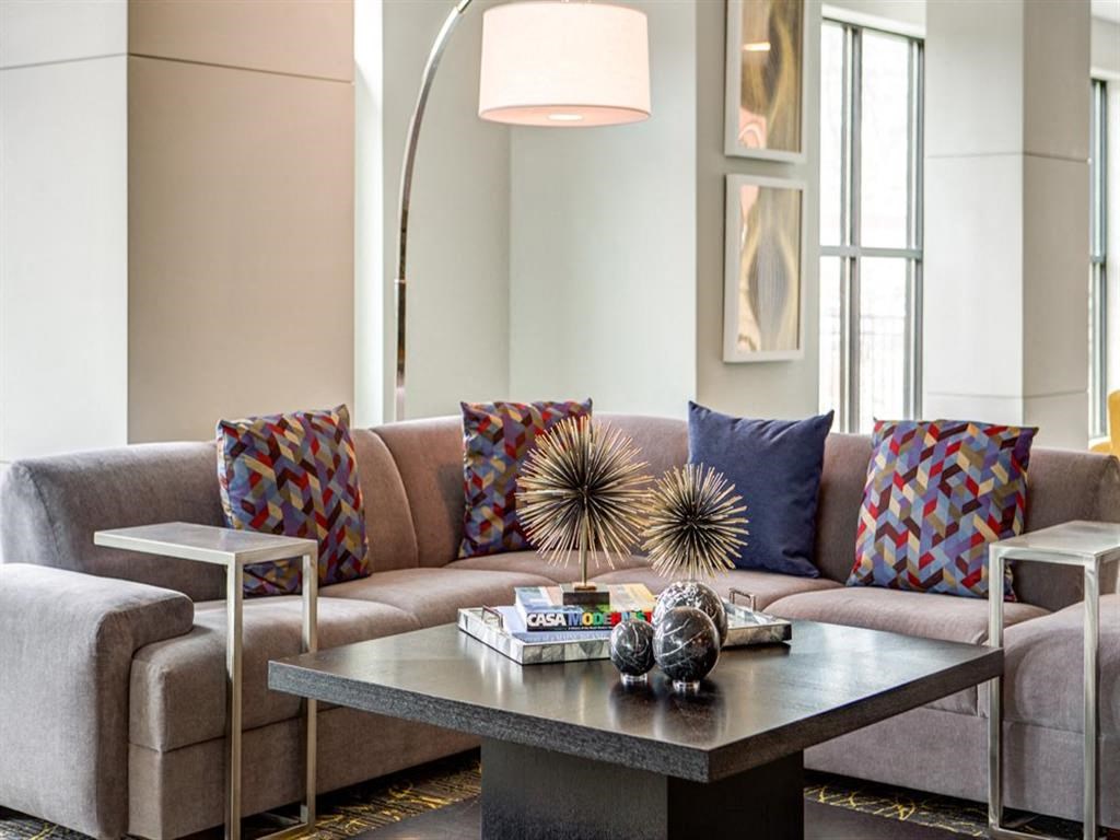 a living room with couches and a coffee table