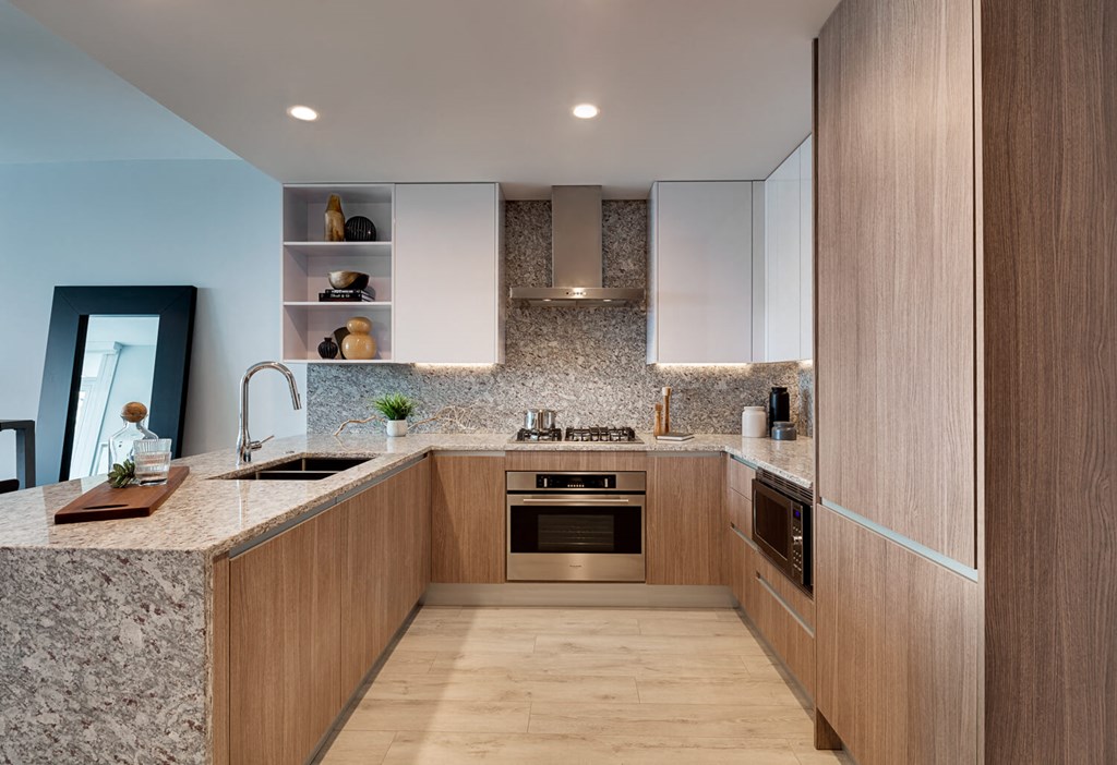 a kitchen with wooden cabinets and a counter top