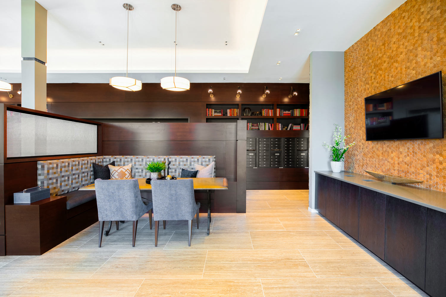 a dining room with a table and chairs