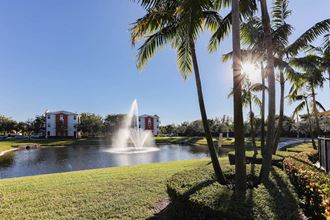 landscaping lush landscaping round lake with fountain
