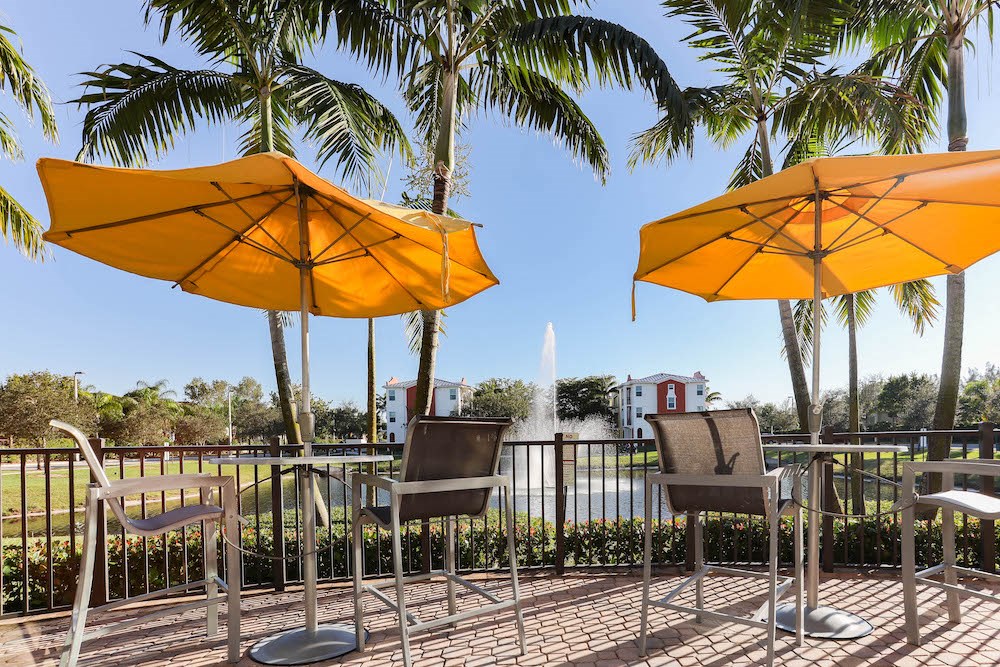 shaded outdoor seating overlooking lake