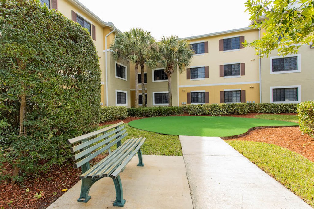 seating by putting green at highland gardens II