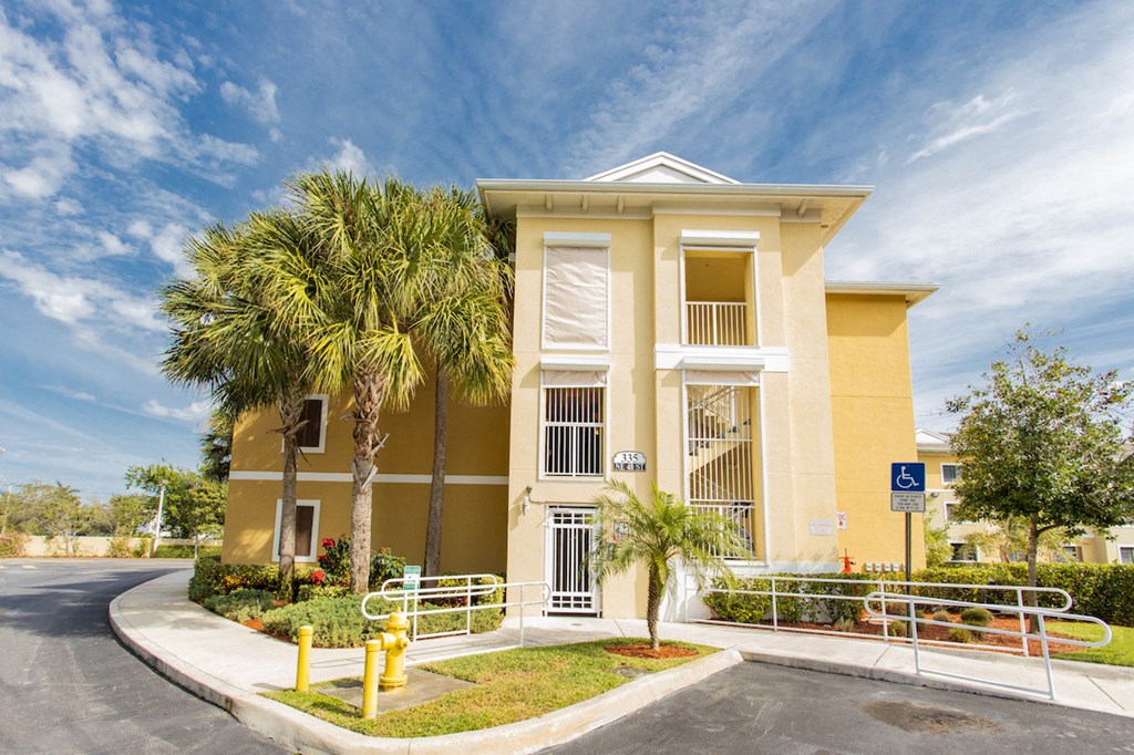 outside Highland Gardens II with handrails at sidewalks