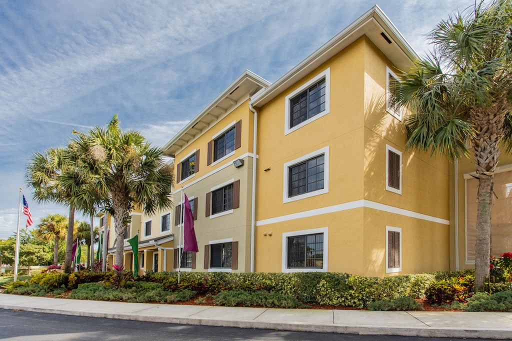 well-kept community with neat landscaping and sidewalks