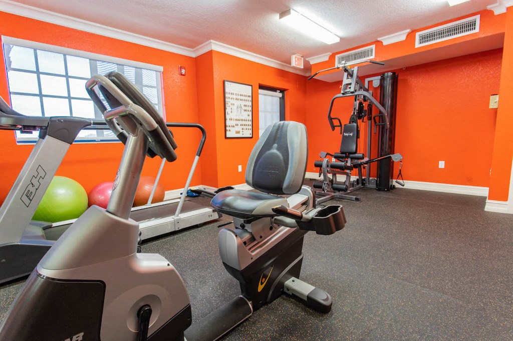 fitness center with cardio and strength equipment