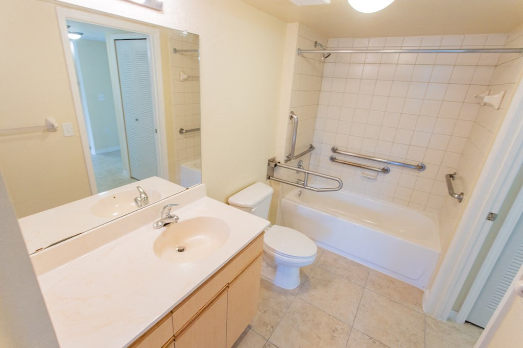 bathroom with grab bars
