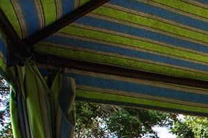 Relax next to the pool under the shade of our poolside cabana Relax next to the pool under the shade of our poolside cabana
