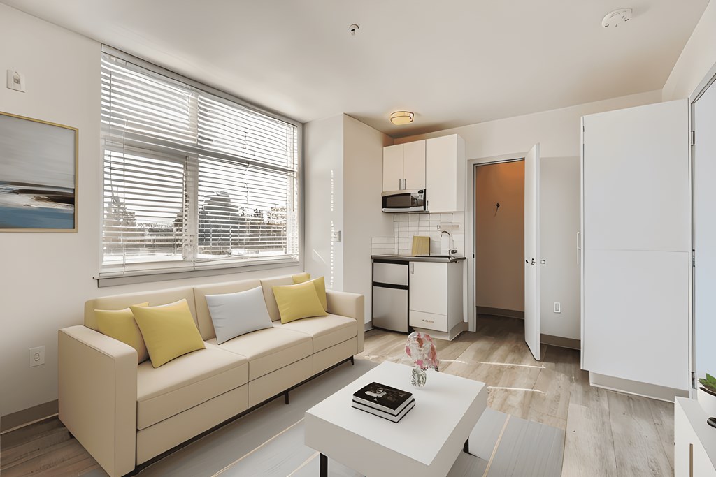 a living room with a couch and a table