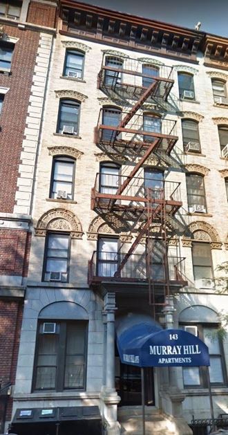 a building with a fire escape on the side of it